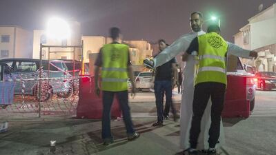 Shiite worshipers are frisked by members of security as they make their way to a hussainiya – a Shiite hall used for commemorations – in the Saudi Arabian town of Qatif, on October 16, 2015. Hussein Radwan/AFP Photo