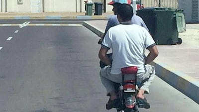 A photo issued by the Ministry of Interior illustrates how not to ride a motorcycle. Courtesy Seucrity Media