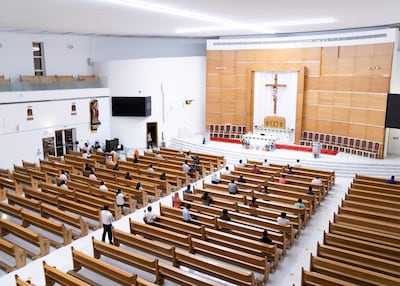 Worshippers attend a service at St Paul’s church in Musaffah, Abu Dhabi. Reem Mohammed / The National