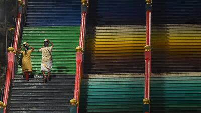 Hindu devotees carry 'Paal Kudam' milk pots for the Thaipusam festival in Kuala Lumpur. AFP