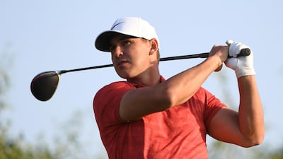 Brooks Koepka tees off on the 11th hole during the first round of the Abu Dhabi HSBC Championship presented by EGA. AP Photo