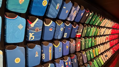 Fooball shirts are displayed on a wall in Miami. Kyle Fitzgerald / The National