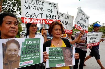 Protesters outside the Senate in Pasay after the death of Jullebee Ranara in Kuwait. AP