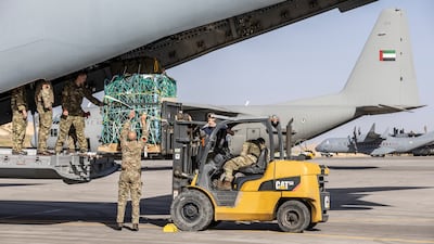 A palette of aid is lifted into the aircraft, with the UK military continuing humanitarian operations to help Gazans.