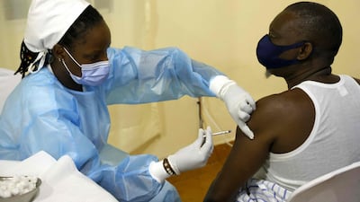 Administering a second dose of Astra Zeneca vaccine to a patient in a Covid-19 vaccination centre in Kigali, Rwanda. AFP