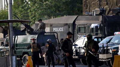 The Popular Mobilisation Forces control one of the entrances to the Green Zone in Baghdad. Reuters