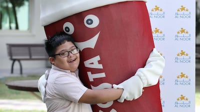 Costa Coffee is aiming to inspire people across the Emirates to help raise AED100,000 for the Al Noor Training Centre with its Hug a Mug initiative. Courtesy Costa