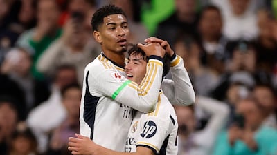 Real Madrid's Brahim Diaz celebrates scoring with teammate Jude Bellingham. AFP