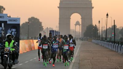 Competitors during the Delhi Half Marathon on Sunday, November 29. AP