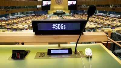 Empty desks fill the UN General Assembly Hall as speakers deliver remarks remotely at the SDG Moment event in 2021. EPA