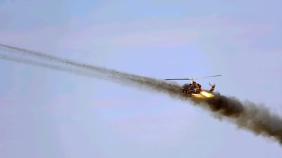 An Iranian Army helicopter launches a weapon during a military exercise in the north-west of the country, close to the border with Azerbaijan. AFP