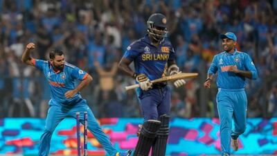 India's Mohammad Shami, left, celebrates the dismissal of Sri Lanka's Angelo Mathews during their World Cup match in Mumbai on Thursday, November 2, 2023. AP
