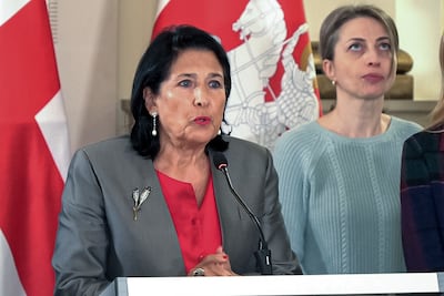 Georgian President Salome Zourabichvili is at odds with the country's prime minister, who rejected claims of election rigging. AP