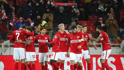 Aleksandr Sobolev celebrates with teammates after scoring Spartak's opening goal. EPA
