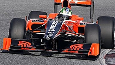 Virgin driver Lucas Di Grassi steers his car during a training session at the Montmelo racetrack on February 25.
