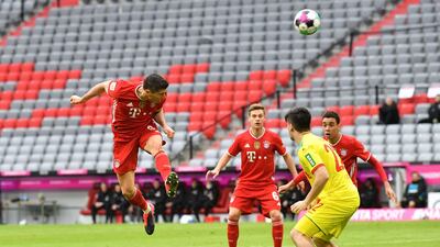 Bayern's Robert Lewandowski heads for goal. AFP