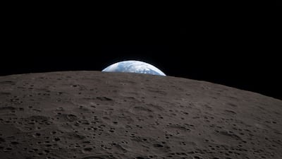 Earth as it sets over the horizon of the moon during the seven-hour lunar flyby by the Artemis II crew on the Orion spacecraft on Monday. Reuters