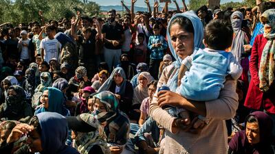 Refugees and migrants protests against their living conditions at the Moria camp on the Greek island of Lesbos on October 1, 2019. AFP