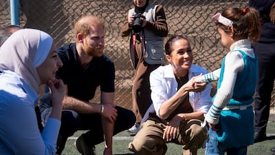 The couple meet children at the Questscope Youth Centre in the Zaatari refugee camp for displaced Syrians, near Mafraq in northern Jordan