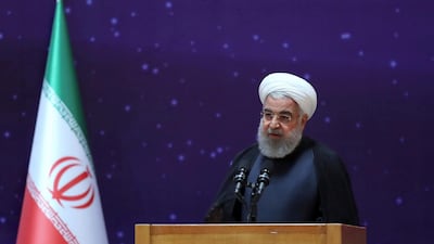 In this photo released by an official website of the office of the Iranian Presidency, President Hassan Rouhani speaks in a ceremony to mark "National Nuclear Day," dedicated to the country's achievements in nuclear technology. Iranian Presidency Office / via AP