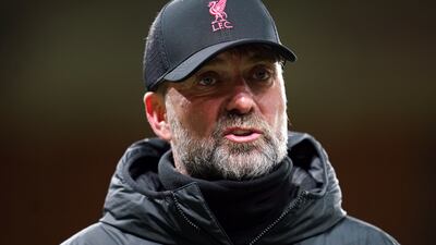 Liverpool manager Jurgen Klopp will miss the match against Chelsea. PA