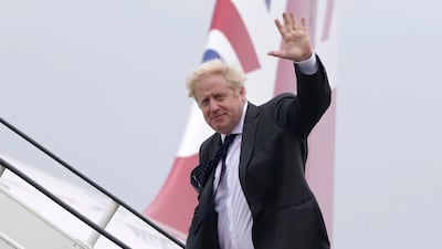 Britain's Prime Minister Boris Johnson boards RAF Voyager at Stansted Airport, ahead of a meeting with US President Joe Biden in Washington. AP Photo