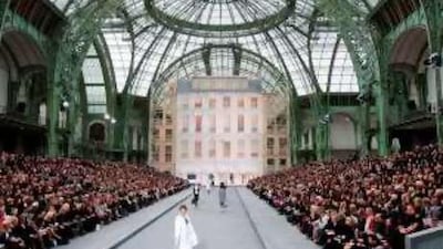 A model presents a creation by the German designer Karl Lagerfeld for Chanel during the spring/summer 2009 ready-to-wear collection show in Paris on Friday.