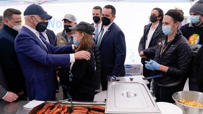 Poland has taken in more than 2.2 million refugees who fled Ukraine after Russian forces entered on February 24, 2022. Mr Biden also met humanitarian aid workers at the stadium. AP