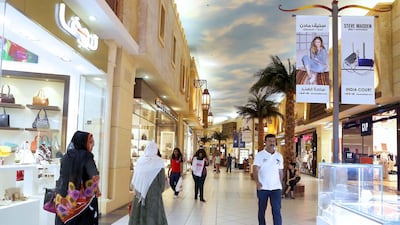 Larger malls such as Ibn Battuta Mall are retaining customers – but footfall is dropping at smaller ones. Pawan Singh / The National