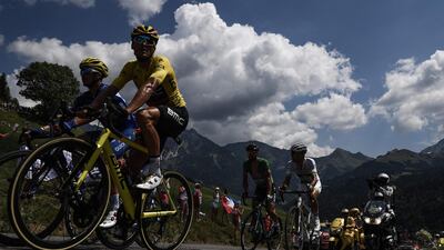 France's Julian Alaphilippe, Belgium's Greg van Avermaet, wearing the overall leader's yellow jersey, Slovakia's Peter Sagan, wearing the best sprinter's green jersey and France's Elie Gesbert ride during a 21-men breakaway in the 10th stage of the Tour de France between Annecy and Le Grand-Bornand. Jeff Pachoud / AFP