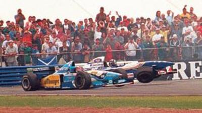 Michael Schumacher and Damon Hill collide on lap 45 of the race.