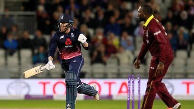 England's Jonny Bairstow, left, scored his first ODI hundred on Tuesday night. Jason Cairnduff / Reuters