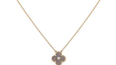 The Vintage Alhambra pendant consists of pink gold, grey mother-of-pearl and a round diamond (Courtesy: Van Cleef & Arpels)
