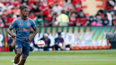 Manchester United's new signing Tyrell Malacia trains for the team's friendly against Liverpool in Bangkok. EPA