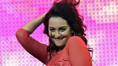 Bollywood actress Sonakshi Sinha performs on stage at the Mid Florida Credit Union Amphitheater during the IIFA Magic of the Movies show on the third day of the 15th International Indian Film Academy (IIFA) Awards in Tampa, Florida, April 25, 2014. Jewel Samad / AFP