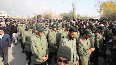 Members of Iran's Islamic Revolutionary Guard Corps take part in a demonstration against American crimes in Tehran. AFP