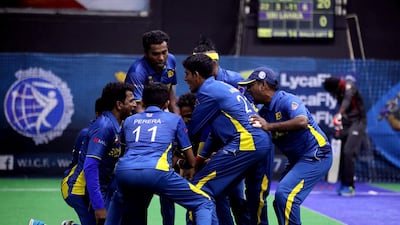 Sri Lanka players celebrate another wicket during the W.I.C.F Indoor Cricket World Cup in 2017 at Insportz, Al Quoz, Dubai. Chris Whiteoak / The National
