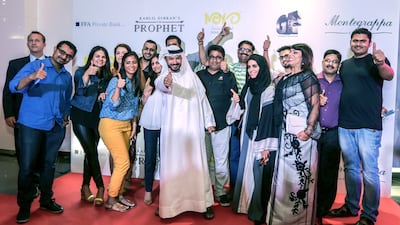 Mohammed Saeed Harib, centre, at the UAE premiere of The Prophet. Victor Besa for The National