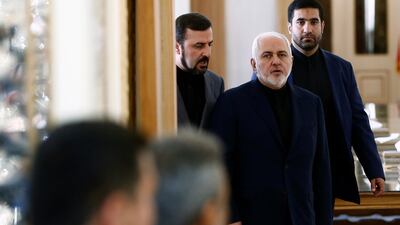 Iranian Foreign Minister Javad Zarif, centre, arrives for a meeting with IAEA acting director general Cornel Feruta (not pictured) in Tehran, Iran. EPA