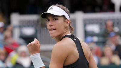 Andrea Petkovic, of Germany, clenches her fist after a point in the final against Jana Cepelova, of Slovakia, during the Family Circle Cup tennis tournament in Charleston. Petkovic won 7-5, 2-6. Mic Smith / AP Photo