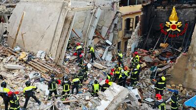 Firefighters at the site of the collapsed four-storey apartment building in Ravanusa, Sicily, on Sunday. AFP