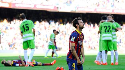 Cesc Fabregas and his Barcelona teammates react after allowing Lafita's second goal to allow Getafe to earn a draw Camp Nou on May 3, 2014 in Barcelona, Spain, denting Barca's title chances. David Ramos / Getty Images