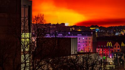 This general view taken on March 30 shows fire and smoke lighting up the night sky, east of Kharkiv. AFP