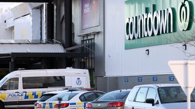Police guard the area around Countdown LynnMall where a violent extremist reportedly stabbed six people before being shot by police. Getty Images