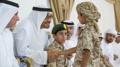 Sheikh Mohammed bin Zayed, Crown Prince of Abu Dhabi and Deputy Supreme Commander of the Armed Forces, offers condolences to the family of martyr Nasser Al Blooshi, who passed away this week from injuries sustained while serving in Yemen. Mohamed Al Hammadi / Crown Prince Court - Abu Dhabi