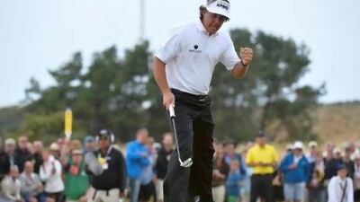 Phil Mickelson grabs a birdie on 14th green during the final round of the British Open.