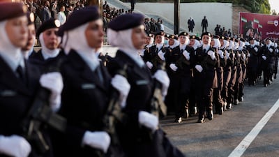 Members of the First Class of the Women's Police Institute, the first female members of the police force in Syria, march during their graduation ceremony, in Damascus. Reuters