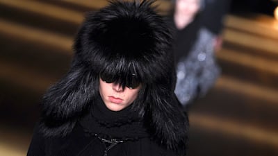 A model wears a Saint Laurent creation at its 2018/2019 autumn/winter presentation. The brand's parent company Kering has announced that it is going fu-free. AFP