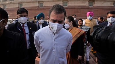 Congress leader Rahul Gandhi with party president Sonia Gandhi arrives to protest against three controversial agriculture laws in Parliament in New Delhi in November. AP Photo