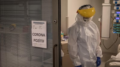 Medical staff attend to a patient infected with the coronavirus in the dedicated intensive care unit at the Acibadem Altunizade Hospital in Istanbul, Turkey. Getty